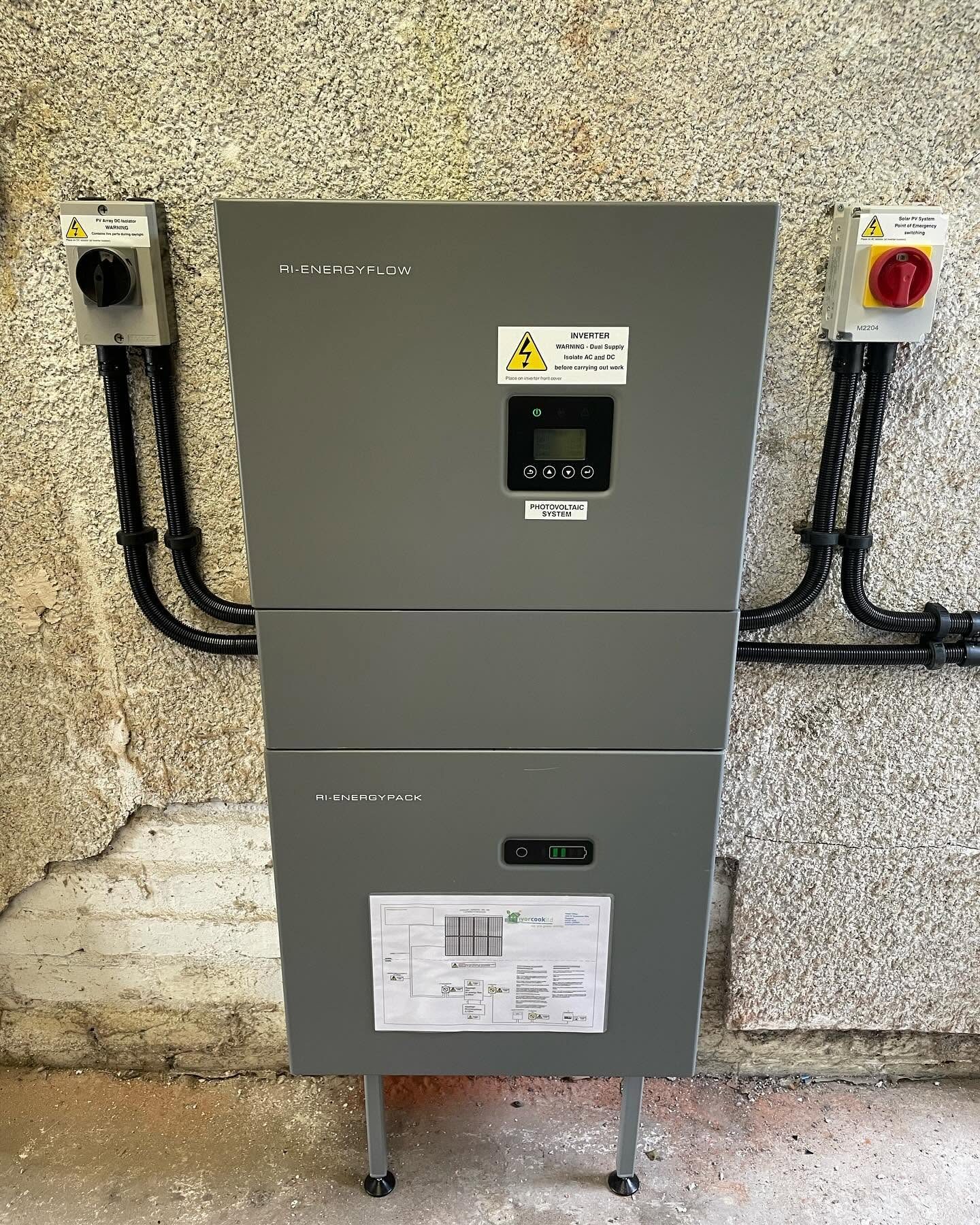 Close-up of an RI-Energyflow inverter and battery system with DC and AC isolators fitted