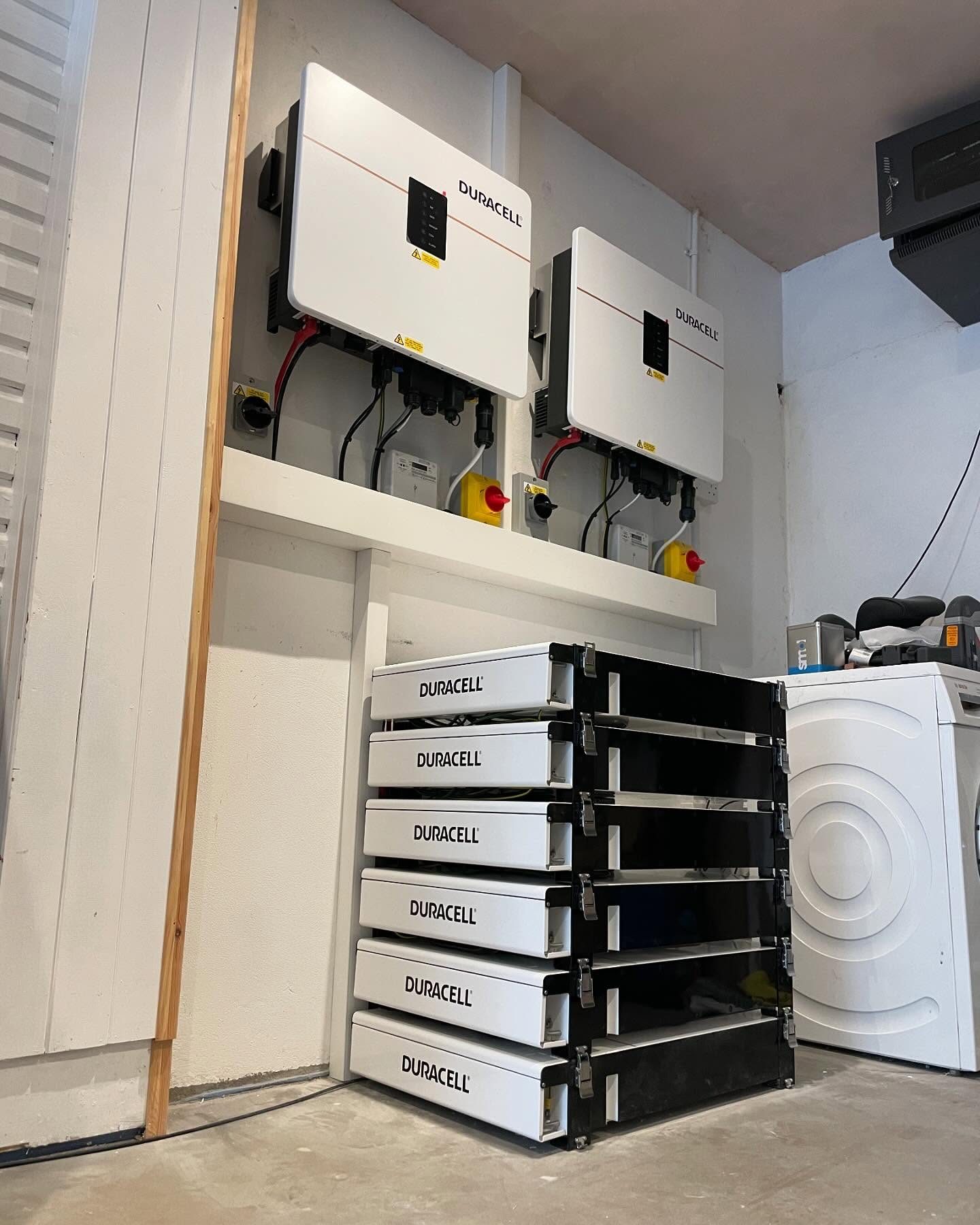 Duracell inverter and stacked home battery storage system installed in a domestic utility room