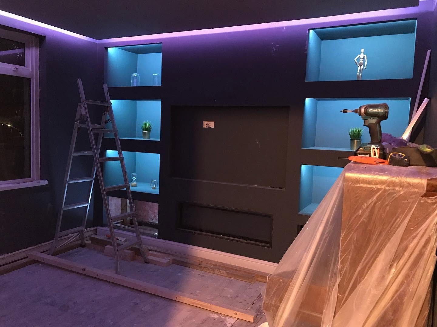 Colour-changing LED alcove and coving lighting installed in a living room