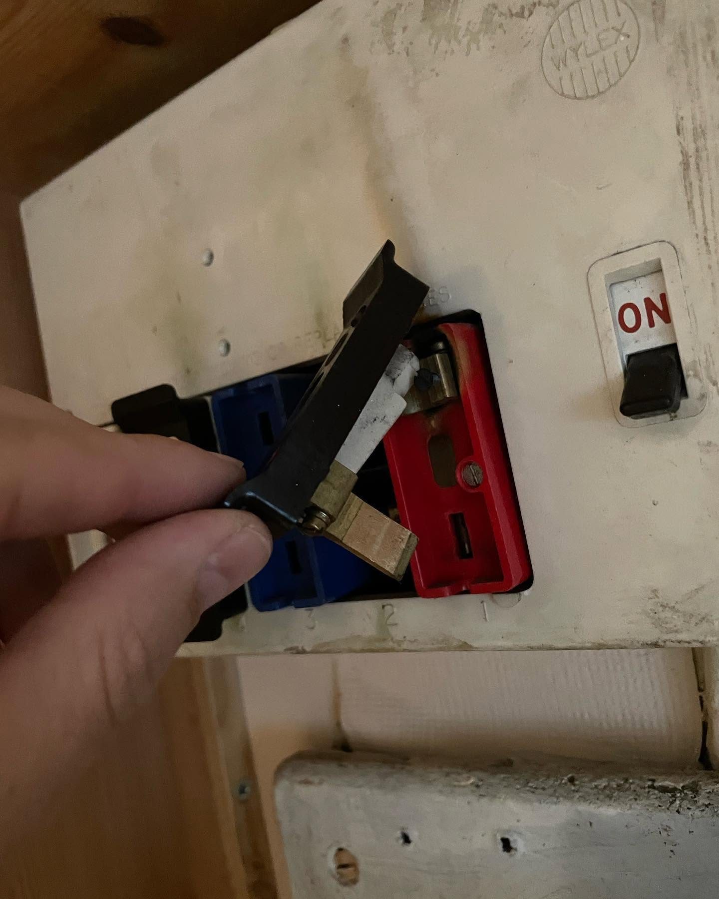Faulty consumer unit switch identified during an electrical safety inspection