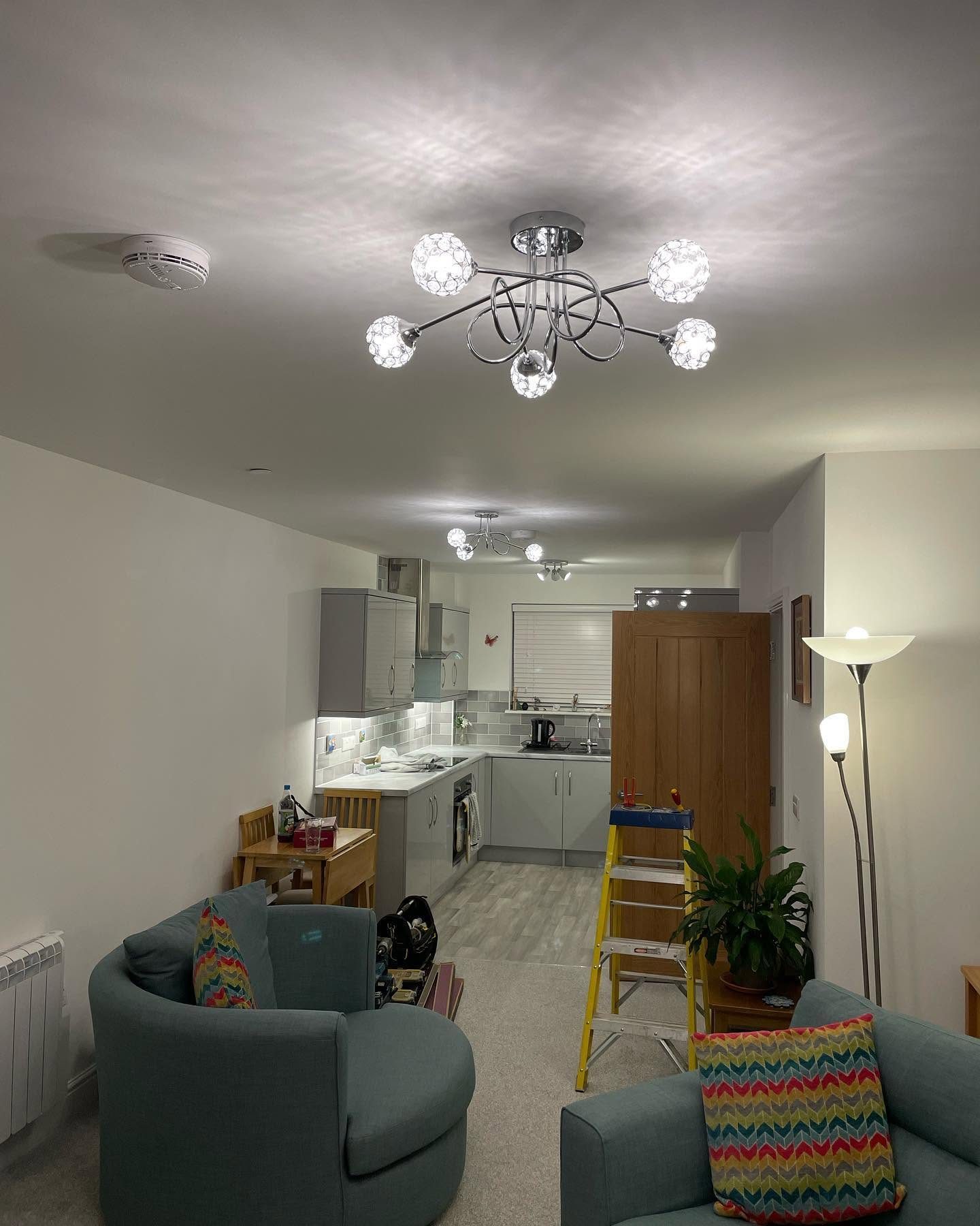 Completed open-plan kitchen and living room after electrical works